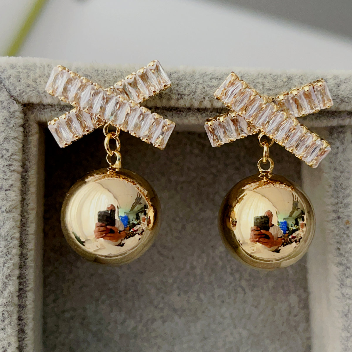 Cross gold ball drop earrings