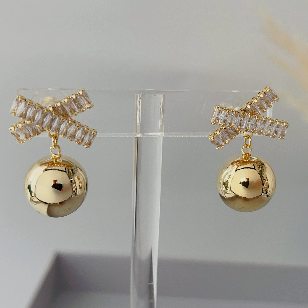 Cross gold ball drop earrings