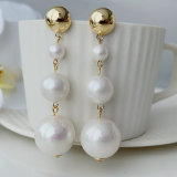 Big drop pearl earrings