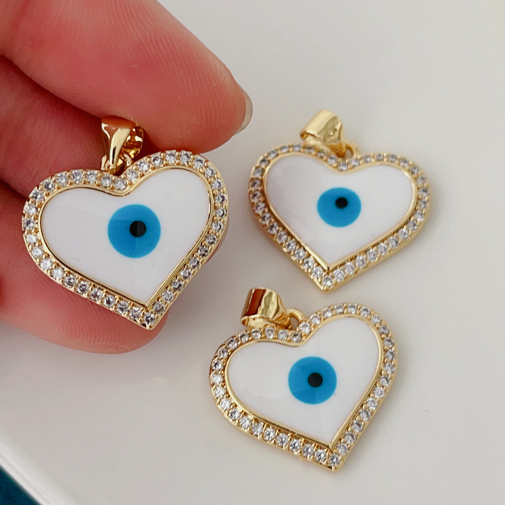 White enamel eye heart charm