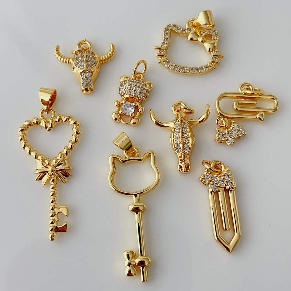Pave key horn charm