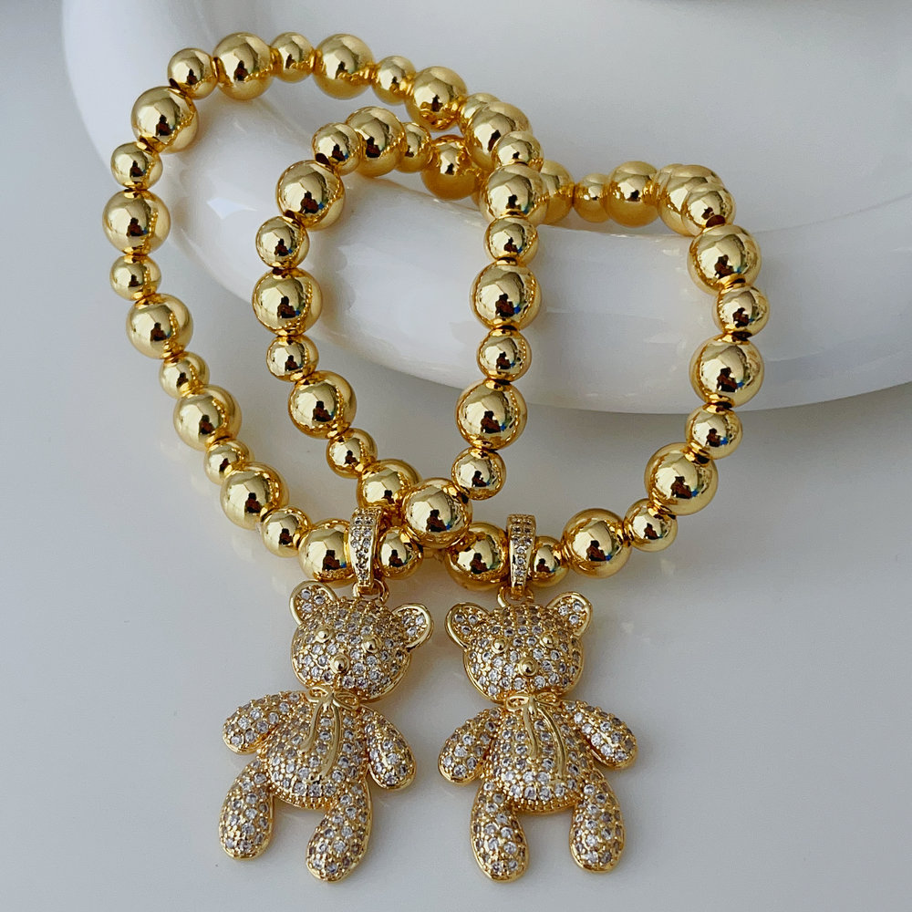 Teddy bear charm gold ball bracelet