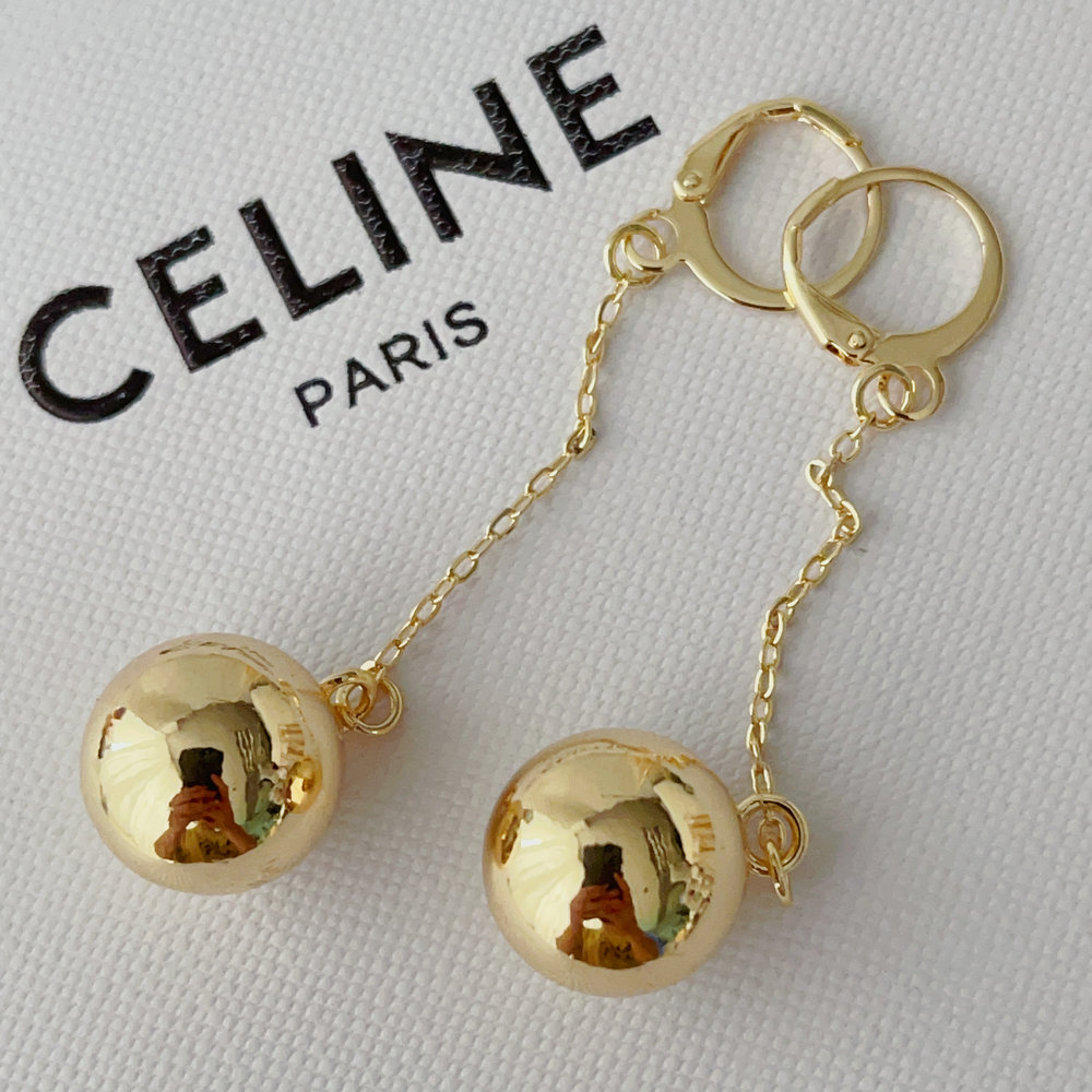 Long gold ball earrings