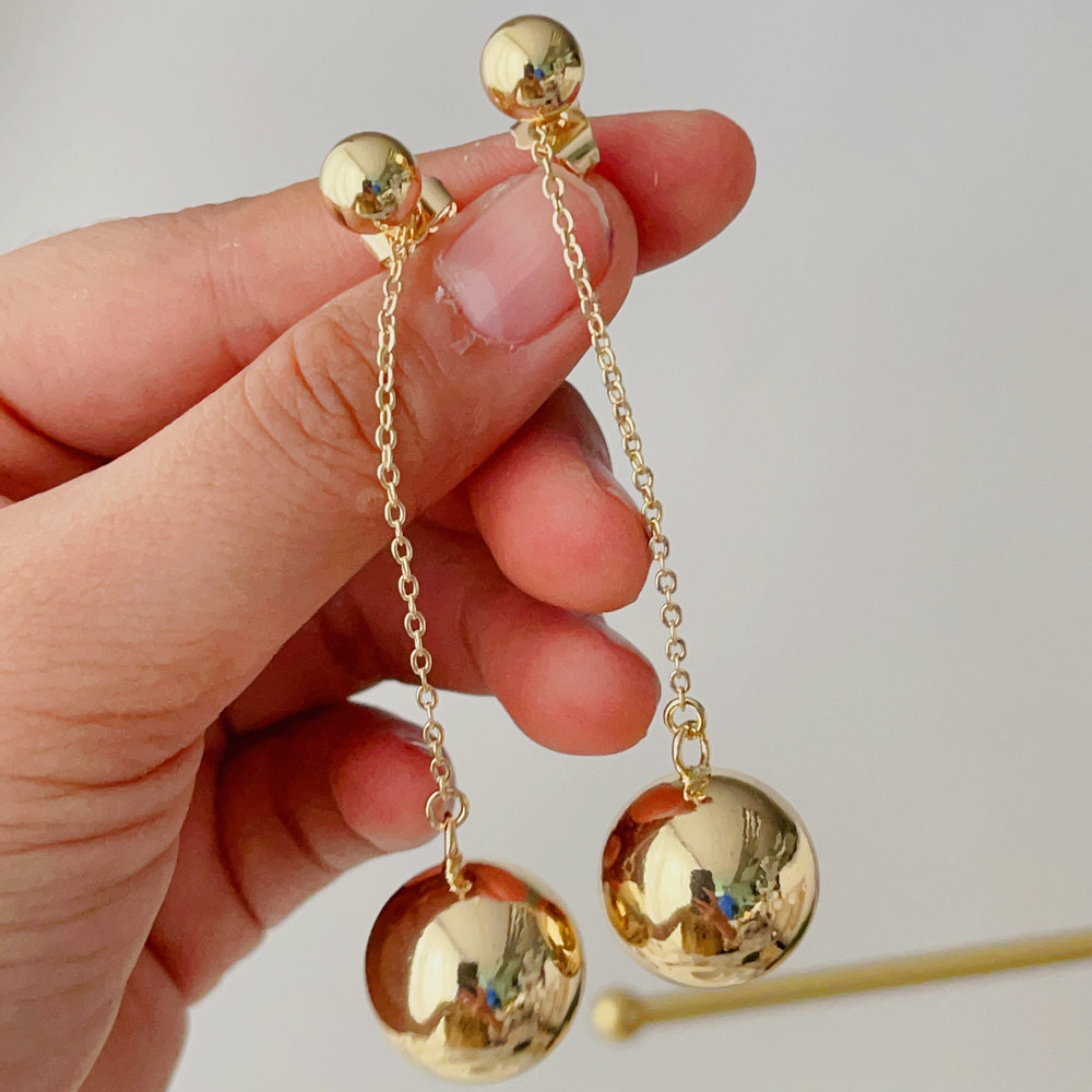 Gold ball drop earrings
