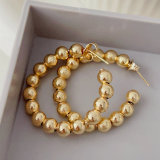 Gold ball hoop