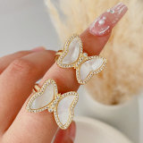 Pave shell butterfly ring