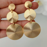 Round charm tassel earrings