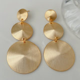 Round charm tassel earrings