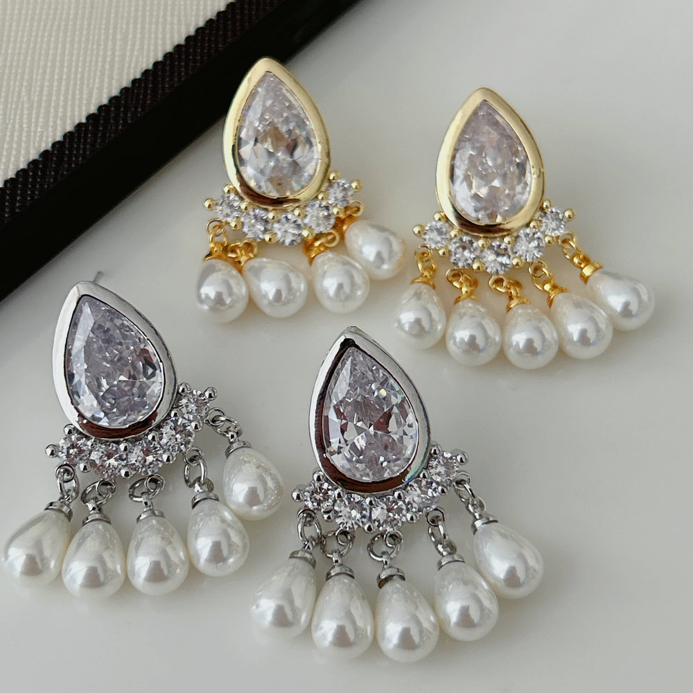Pearl drop charm earrings