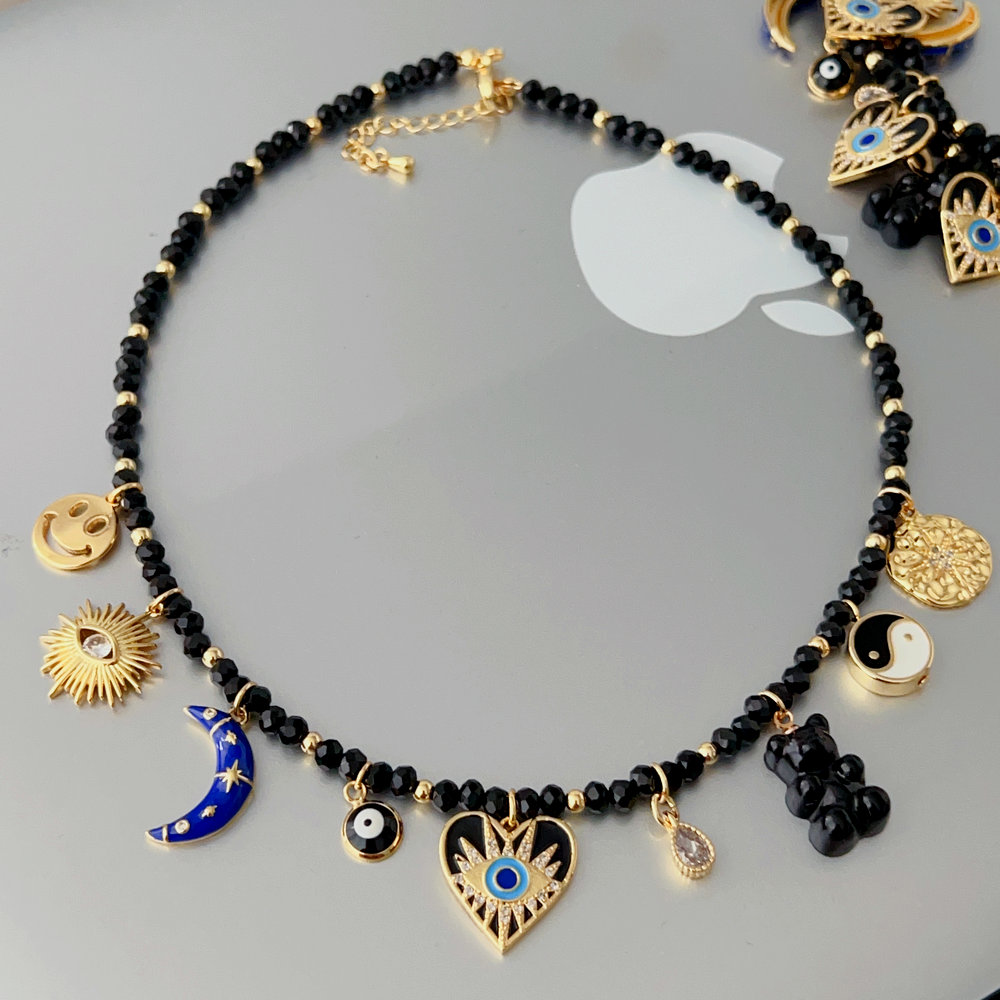 Black glass bead necklace with charms