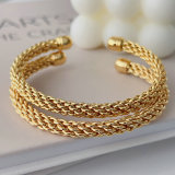 Metal twist bangle