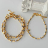 Silver and gold bead bracelet