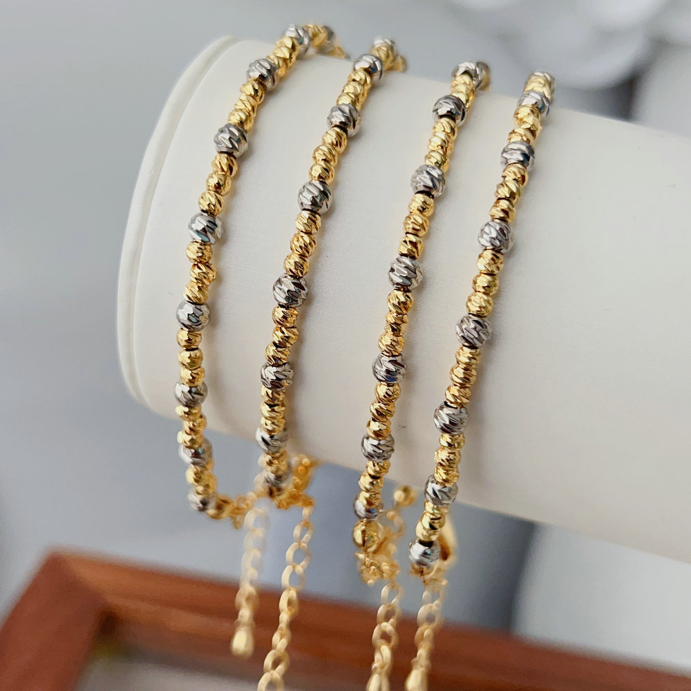 Silver and gold bead bracelet
