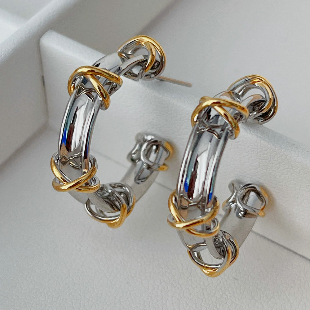 silver and gold mxi hoop earrings