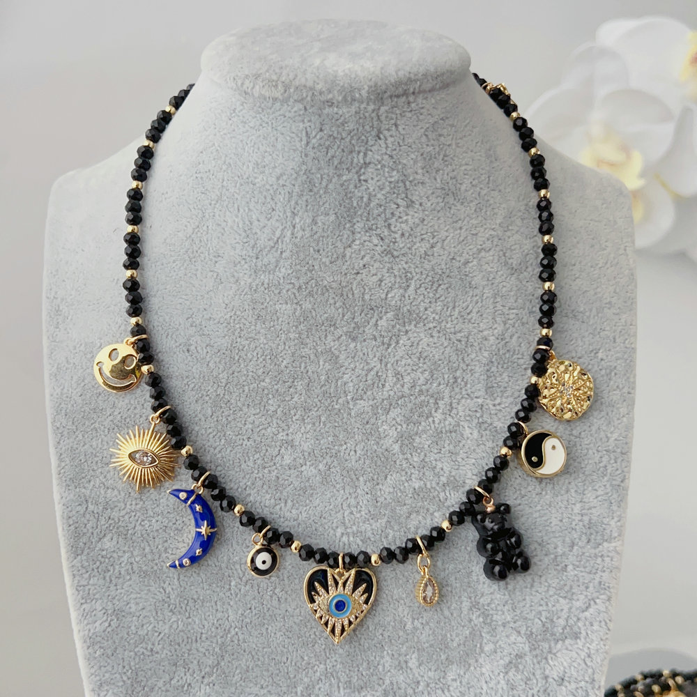 Black glass bead necklace with charms