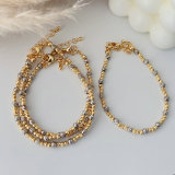 Silver and gold bead bracelet