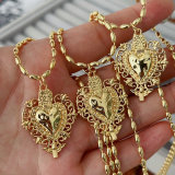 Oval gold bead necklace with heart charm