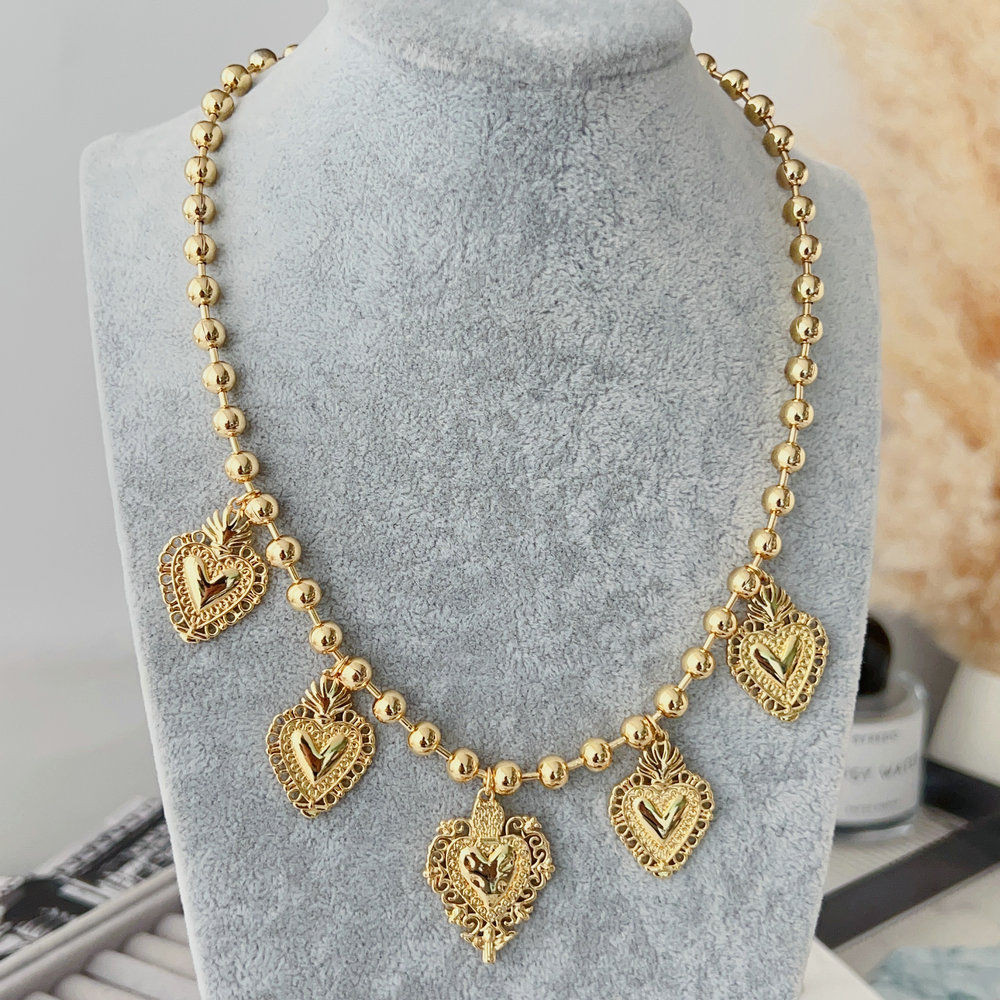 Gold bead chain necklace with heart charm