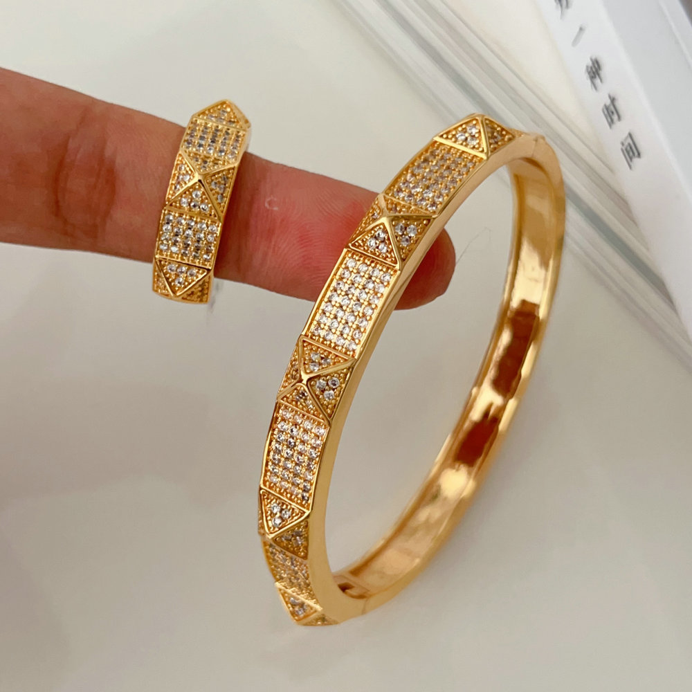 Pave zircon rivet set bangle with ring