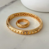 Metal rivet set bangle with ring