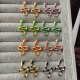 Enamel snake earrings