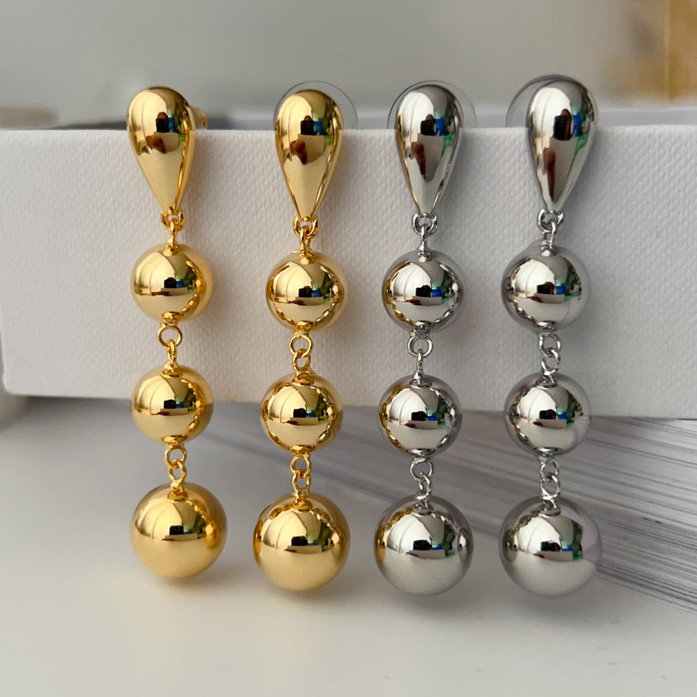 Long ball drop earrings