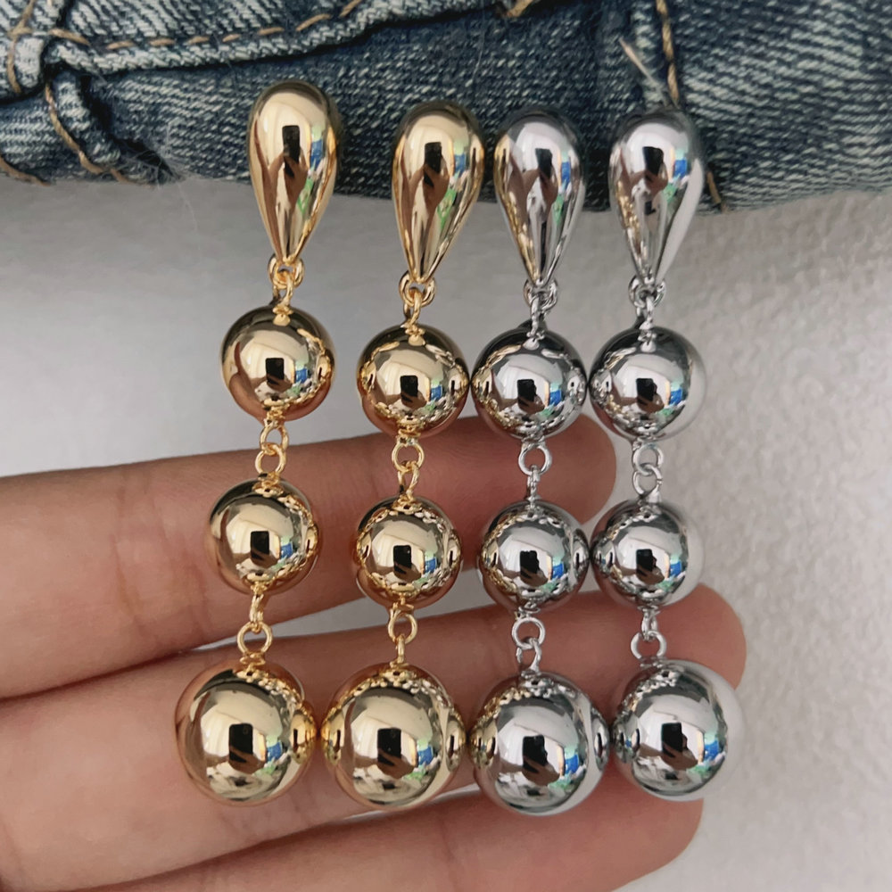 Long ball drop earrings