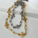 Stainless Tory burch necklace