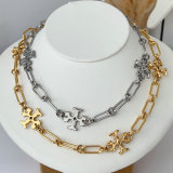 Stainless Tory burch necklace
