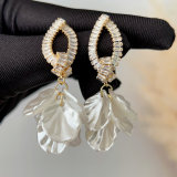 Glass shell charm earrings