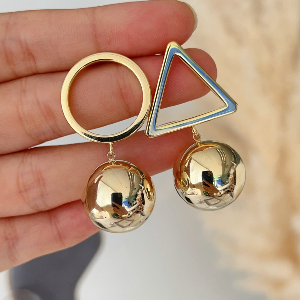 Ball charm earrings