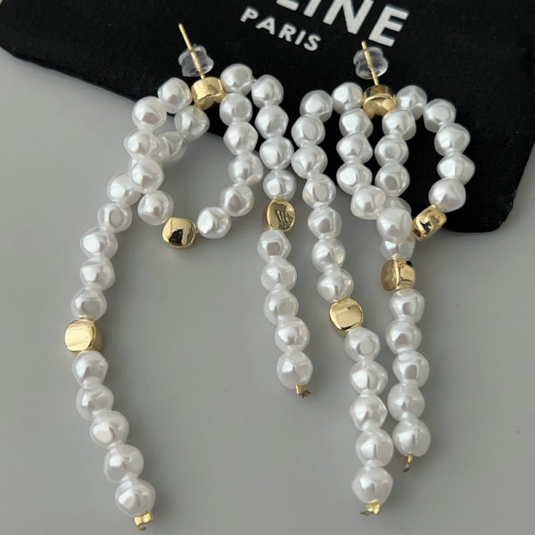 Long pearl tassel earrings