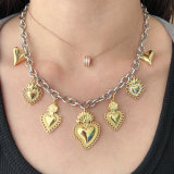 Gold heart charm necklace