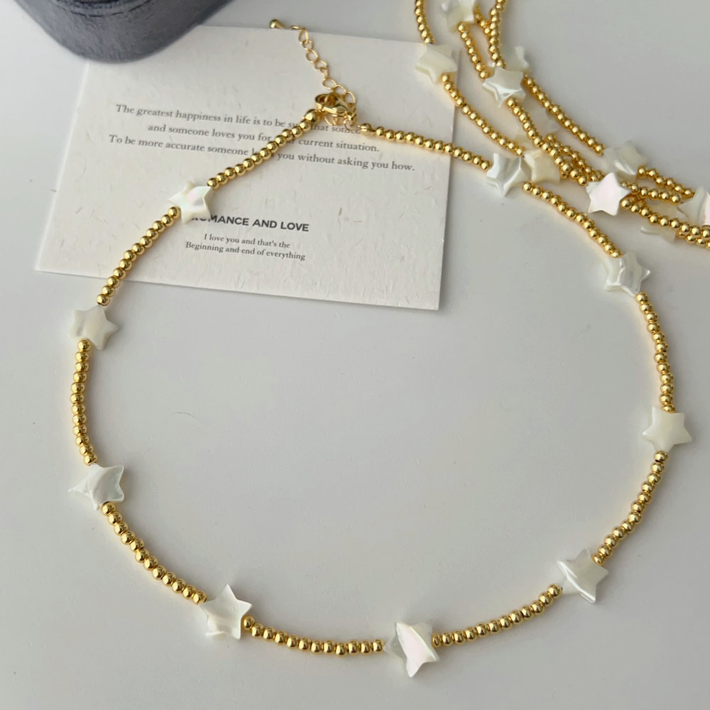 Gold bead necklace with star charm 16inch