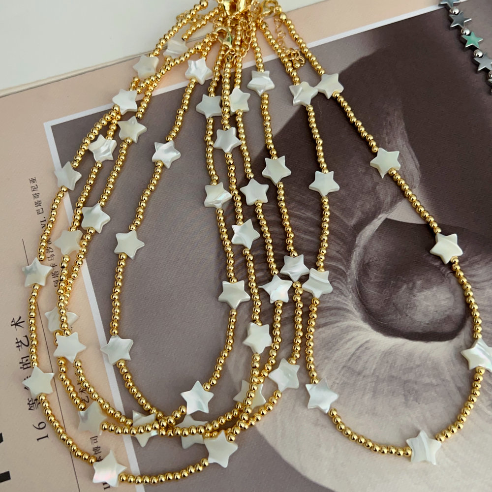 Gold bead necklace with star charm 16inch