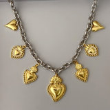 Gold heart charm necklace