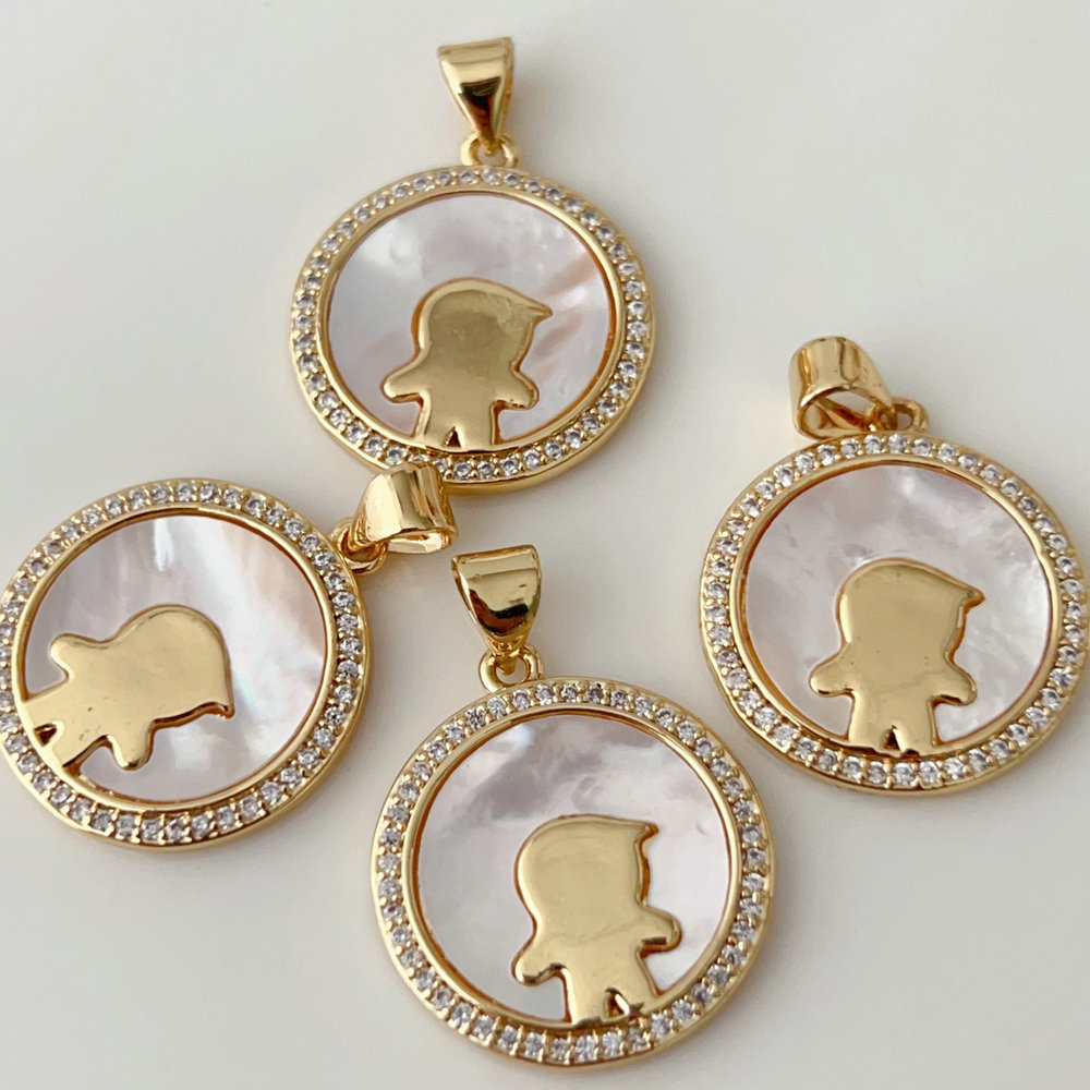 Shell boy round charm