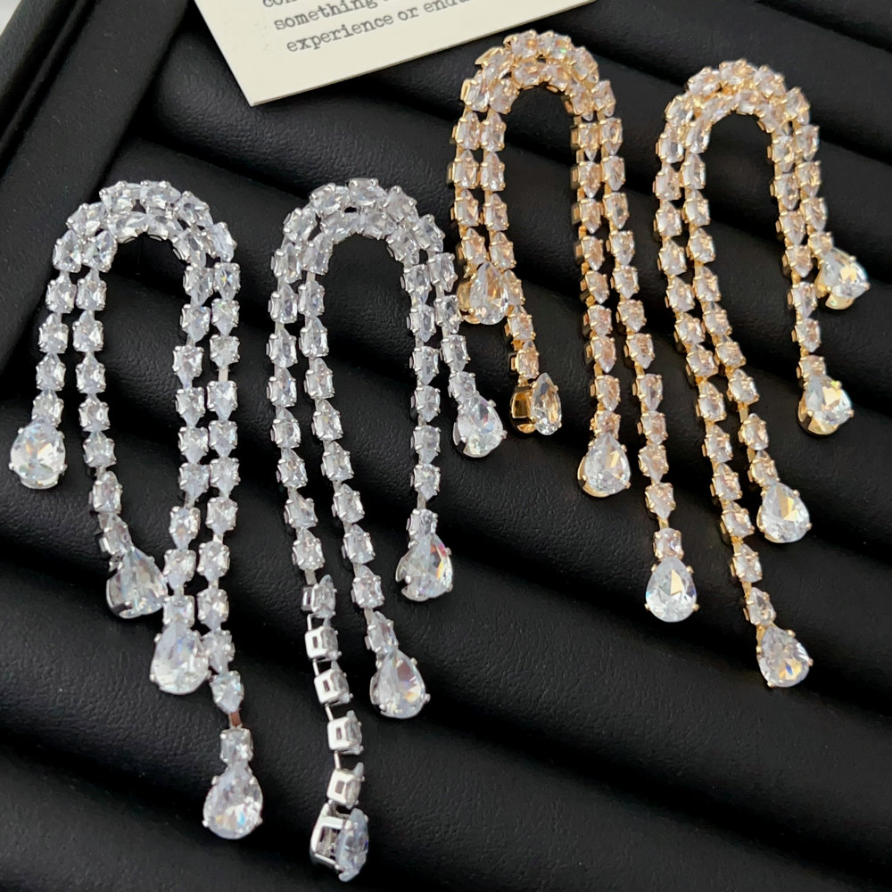 Pave crystal long tassel earrings