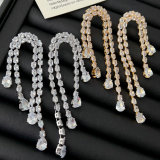 Pave crystal long tassel earrings
