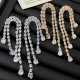 Pave crystal long tassel earrings