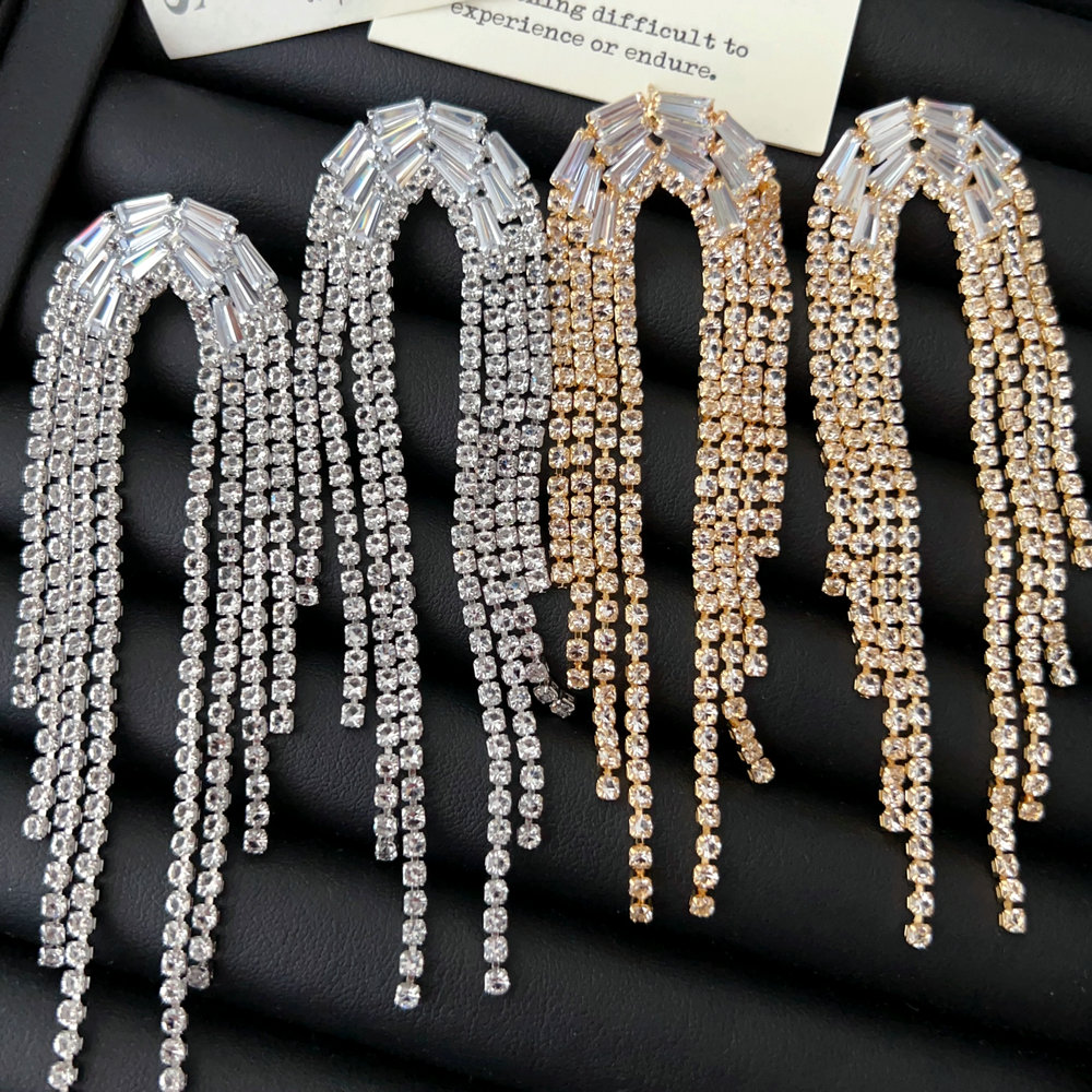 Pave crystal long tassel earrings