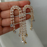 Pave crystal long tassel earrings