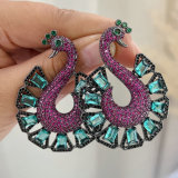 Pave green peacock earrings
