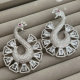 Pave clear peacock earrings