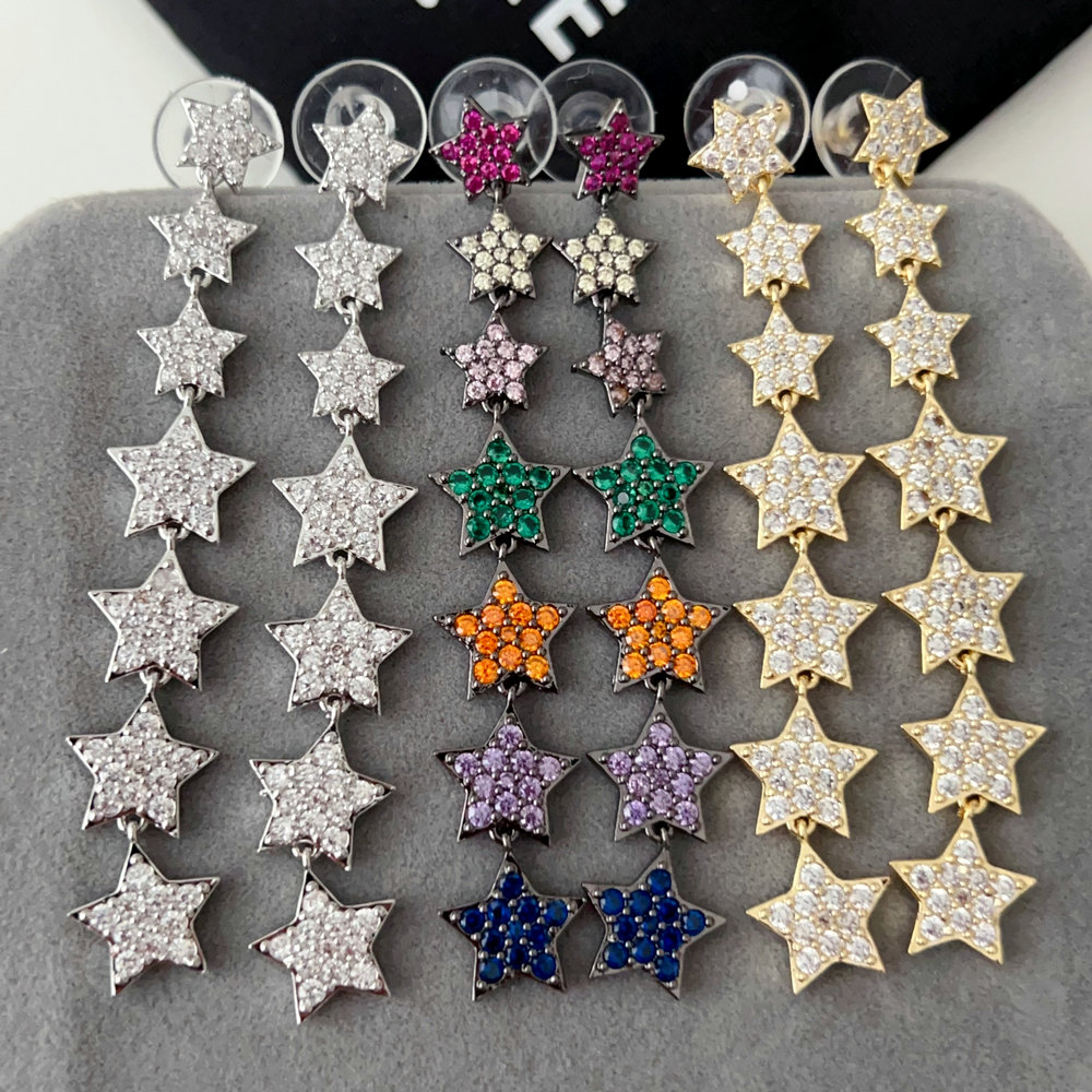 Pave long star earrings