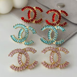Pave zircon color channel earrings