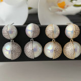 Pearl charm earrings
