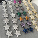 Pave long star earrings