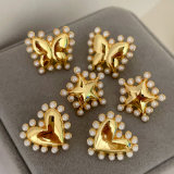 Pearl metal star butterfly earrings