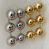 Gold ball long earrings